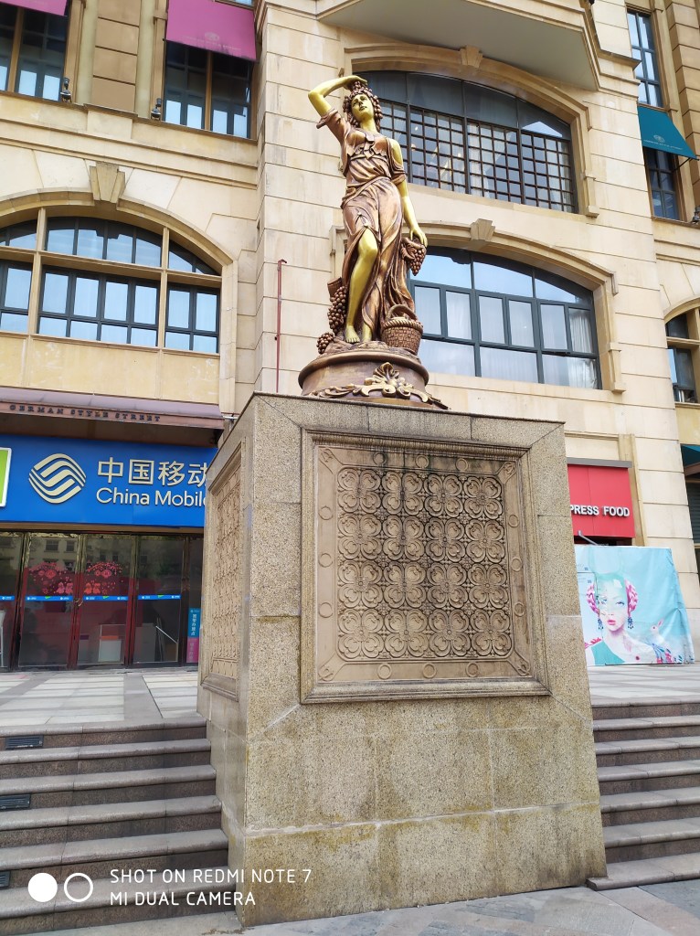 Statue of woman in Guanggu shopping center in Wuhan. Photo taken in 2019.