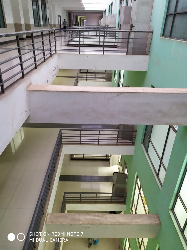 The photo shows a teaching building on a Wuhan campus from 2019.