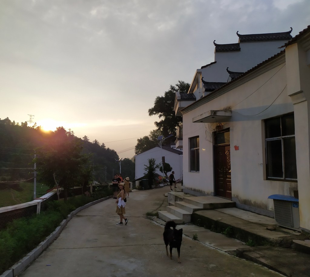 This is a picture of a sunset in a Chinese mountain village in 2020.
