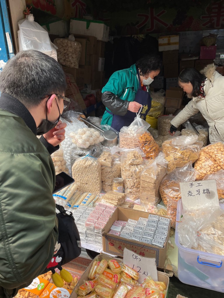 This photo shows a collection of Chinese snacks being sold in the streets of Wuchang, Wuhan, China in 2021.
