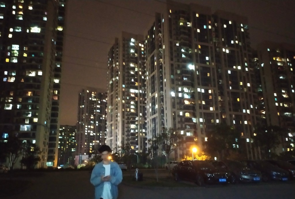 This photo shows apartment towers at night in Wuhan, China in 2020.