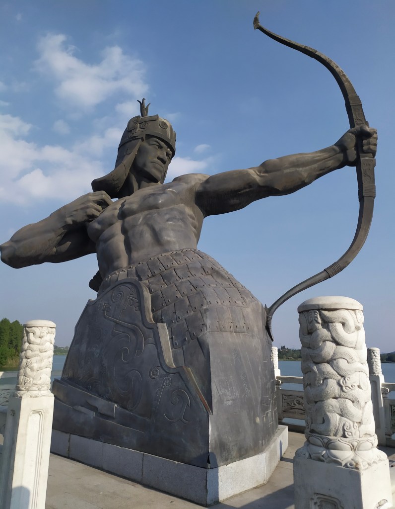 This photo shows a statue of Hou Yi the archer on a bridge at East Lake, Wuhan, PRC. 