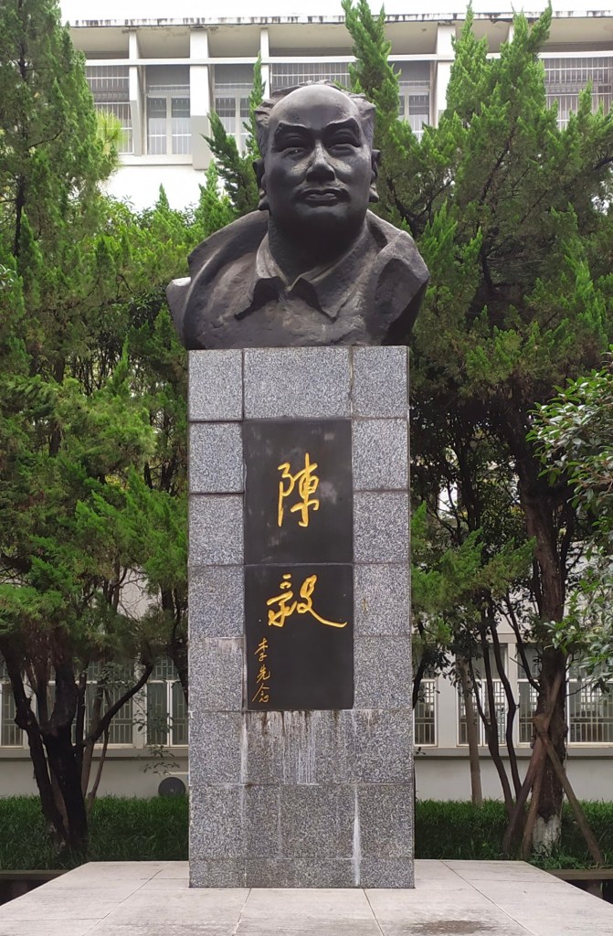This photo shows a monumental bust of a man on the campus of a university in Wuhan, China. 
