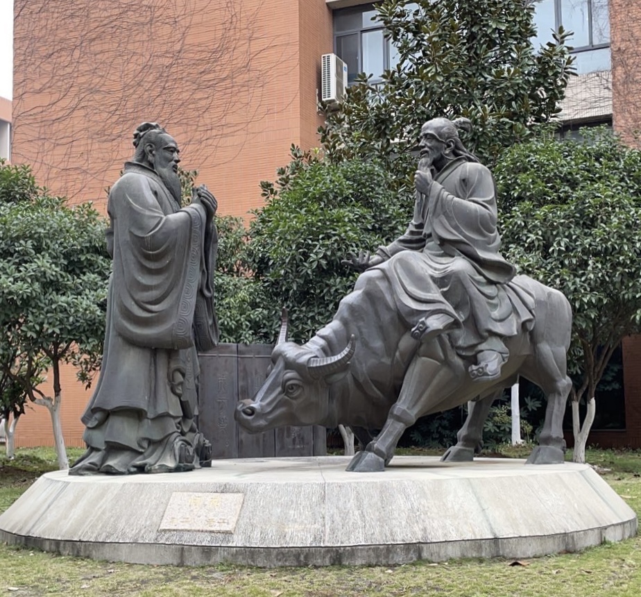 This is a photo of some statues of Confucius and Laozi on the campus of Wenhua College in Wuhan, China (2020)