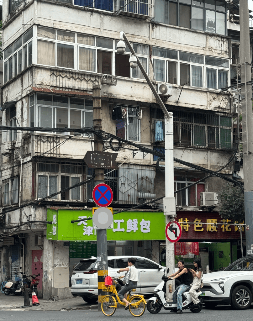 This is a photo of apartments and restaurants in Wuhan, China in 2026. Residential area in China.