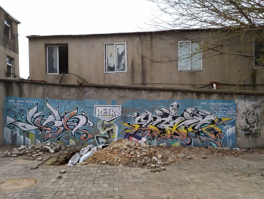 A photo of a wall mural in Wenhua College's campus in Wuhan, China. The photo is from the pandemic era. 